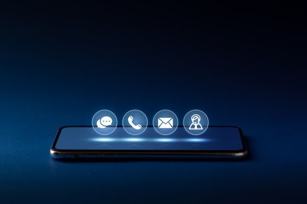 Contact us business icon on computer keyboard with the globe _ Premium Photo